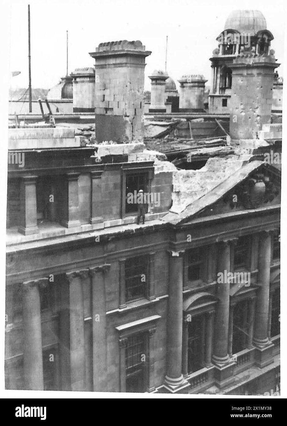 Buildings in Whitehall show damage caused by enemy air attacks during ...