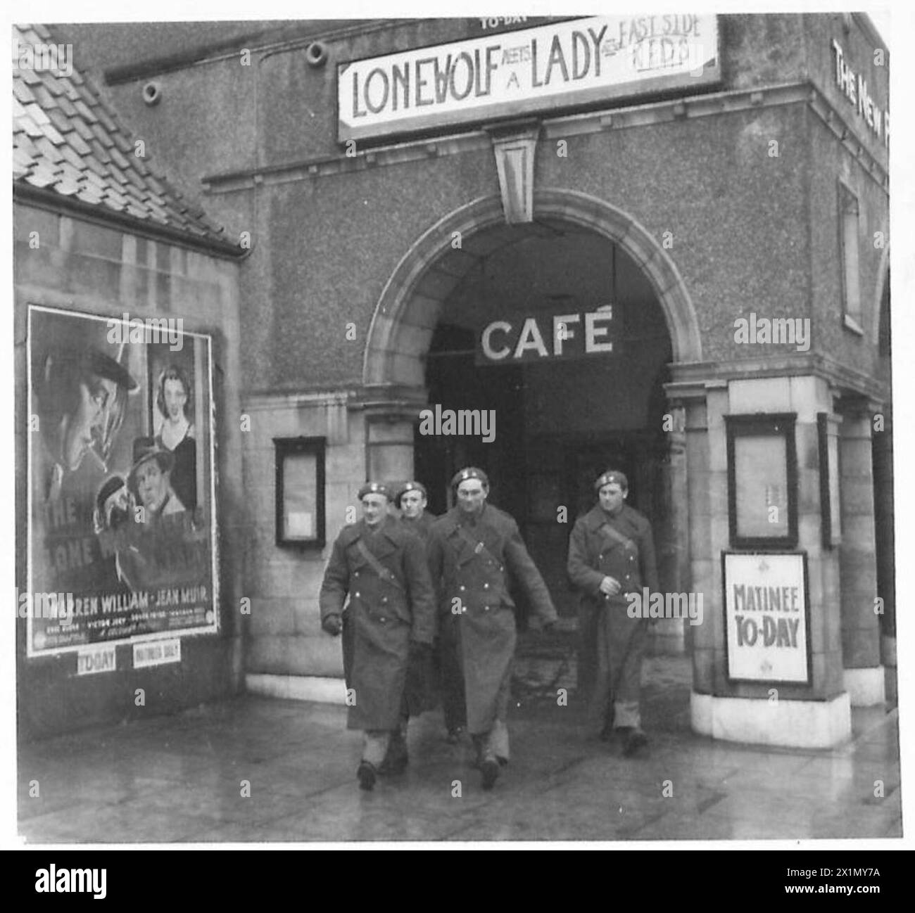 THE POLISH ARMY IN BRITAIN, 1940-1947 - Polish soldiers leaving the local cinema in Cupar. The movie shown on that day was ' The Lone Wolf Meets a Lady'. A special series of photographs dealing with the domestic and social life of troops of the 1st Rifle Brigade (1st Polish Corps) in Scotland where the officers and men are firmly established favourites with the local people. Some of the young soldiers were attending universities in Poland when war broke out. On arrival in Britain they joined the Polish Forces and continued their studies at the St Andrews University in order to finish their deg Stock Photo