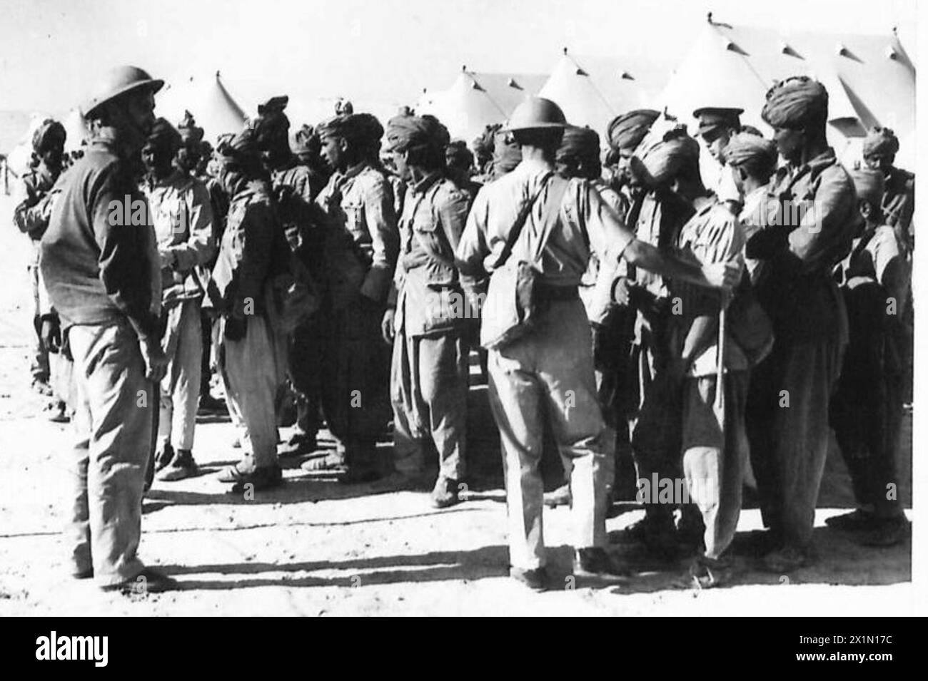 British soldiers check and process Italian prisoners of war, British ...