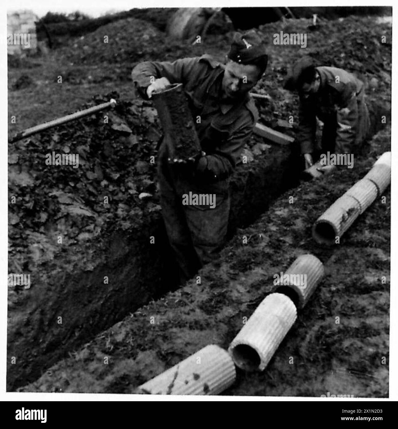 THE PIONEER CORPS - Drain pipes being laid, British Army Stock Photo ...