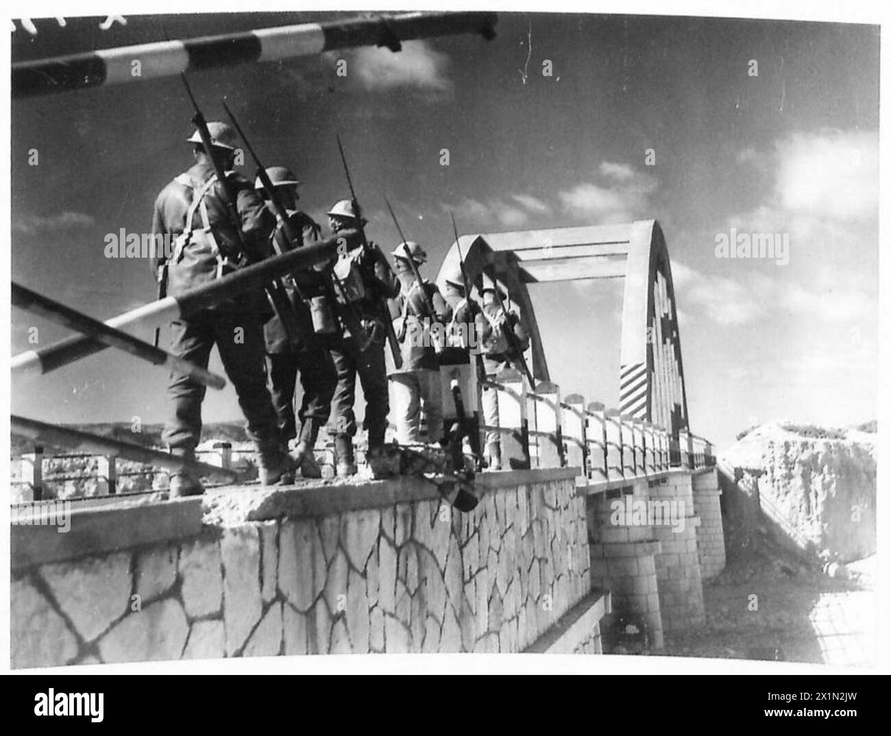 LATEST PICTURES FROM DERNA - Troops passing over one of the few bridges ...