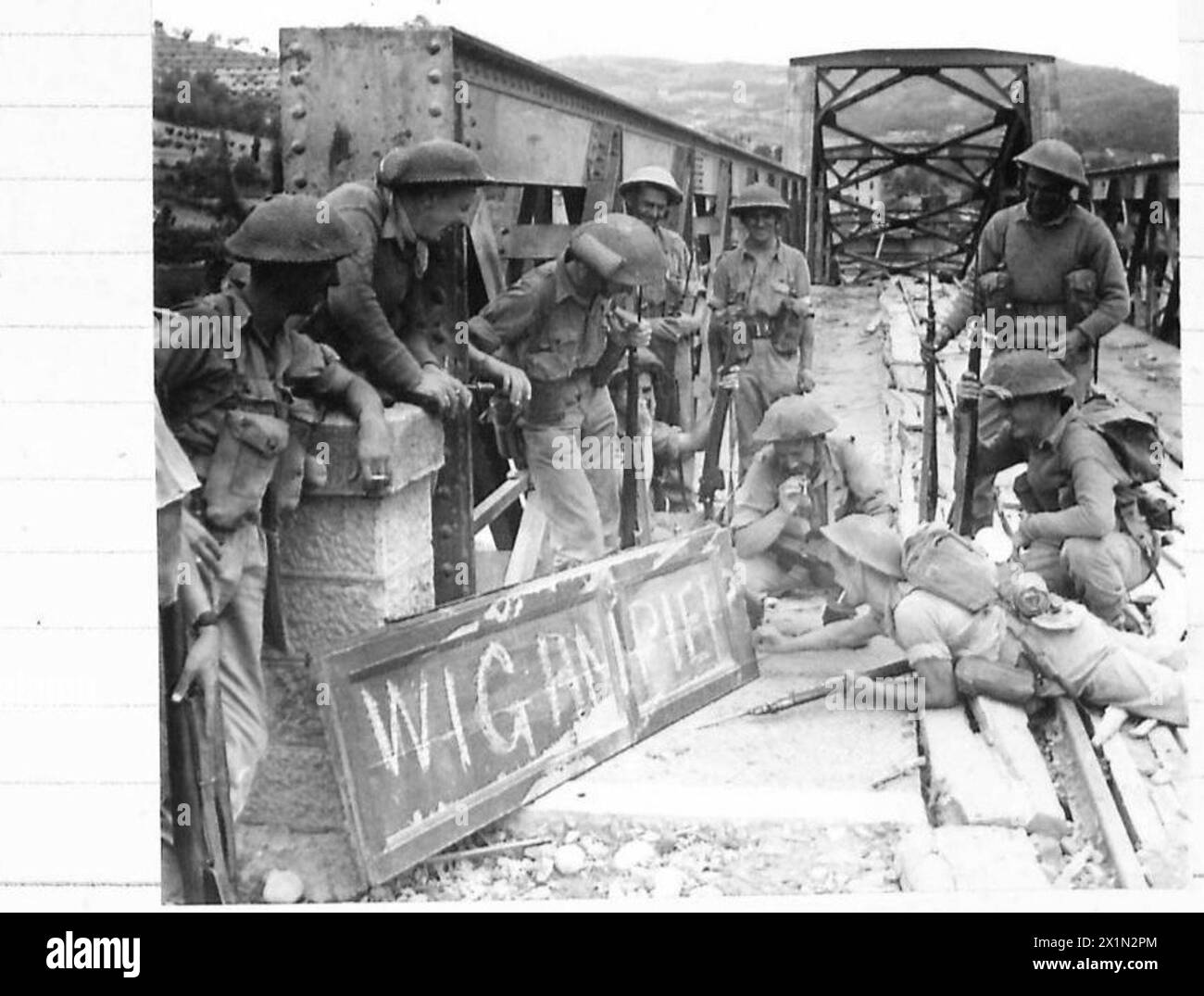 Soldiers from Lancashire towns including Shorley, Manchester, Liverpool, St. Helens, Bolton, Leyland, and Southport participated in capturing Umbertide as part of the Eighth Army operations. Stock Photo