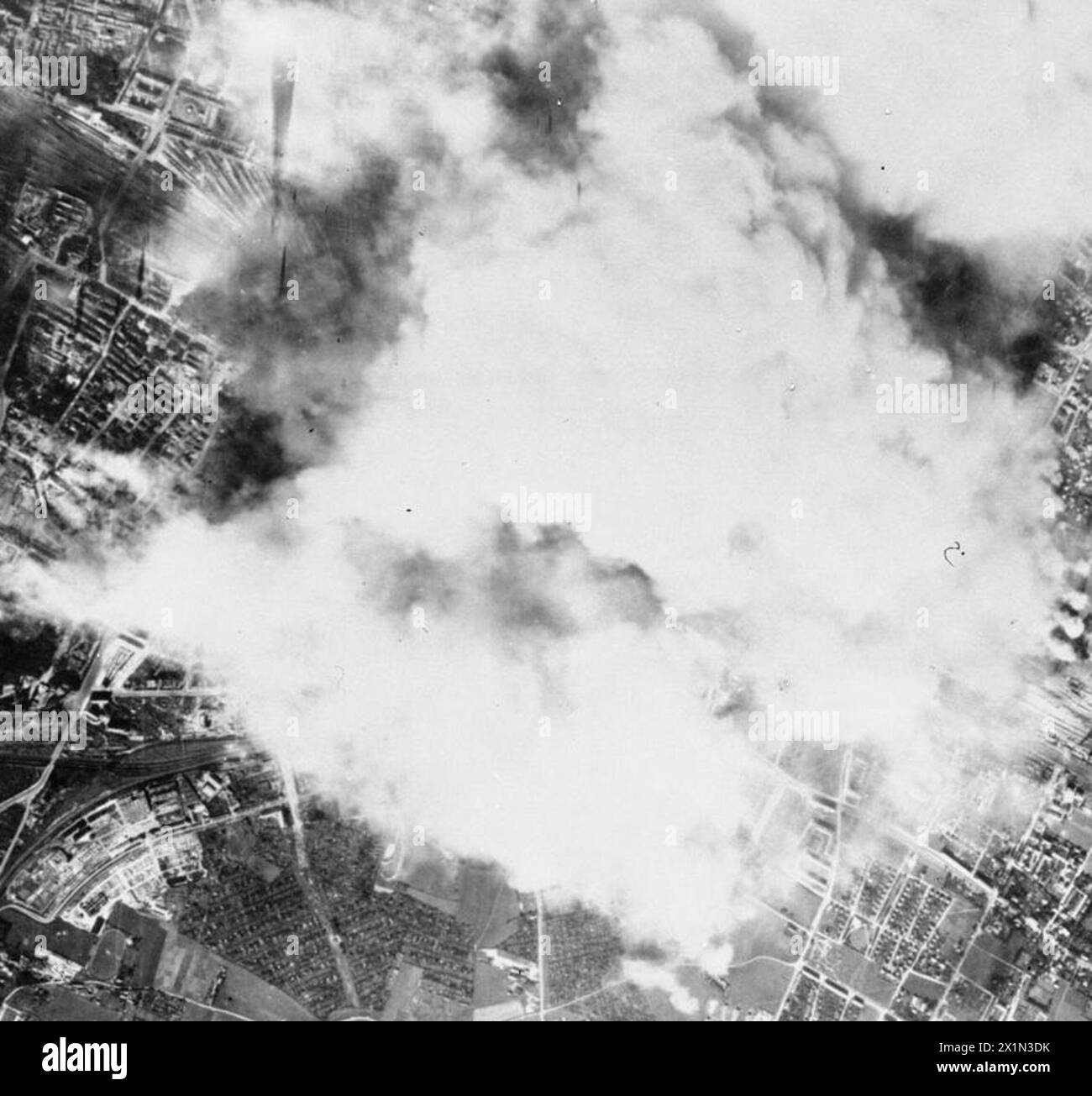 Official photograph - Daylight attack on Munich m/yds (USAAF? 4.10.44?) Image reversed, Stock Photo