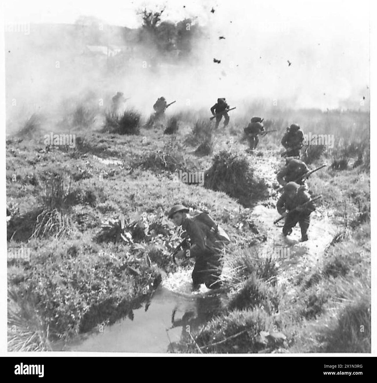 BATTLE SCHOOL TRAINING Live ammunition and smoke screen help to give