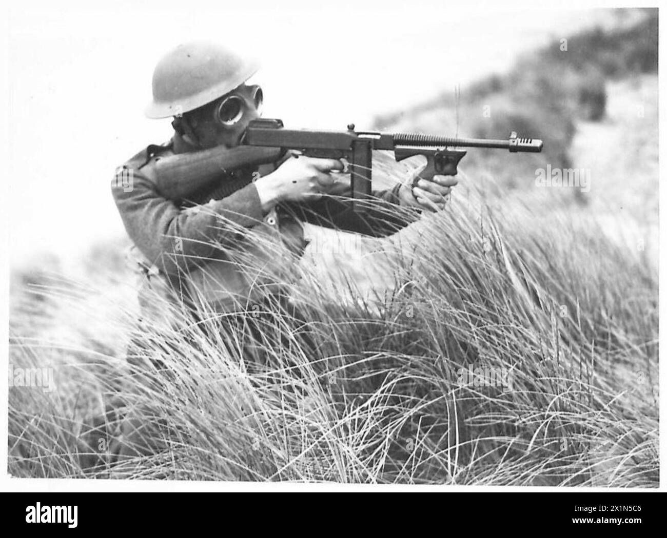 BELGIAN TROOPS IN TRAINING - One of the Belgian soldiers with a Tommy gun, British Army Stock Photo