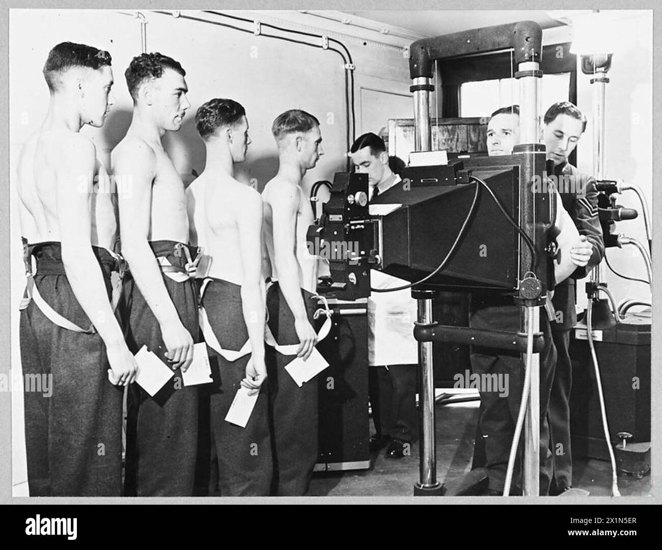A 1943 photograph depicts Royal Air Force aircrew members undergoing X ...