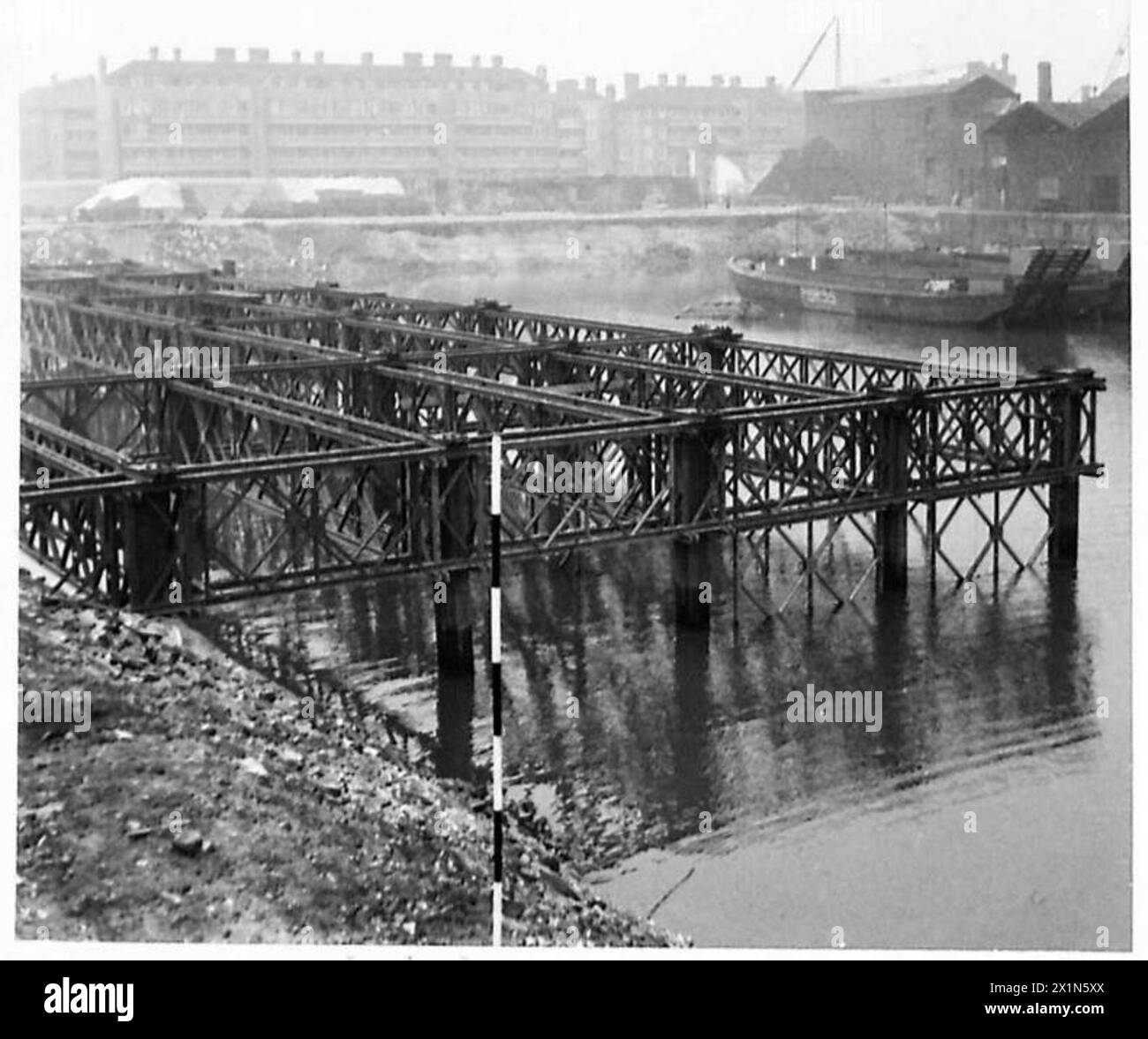 SPECIAL ASSIGNMENT FOR TN.5.E. - Views of Bailey pier with two approach piers as constructed by 963 P.C. & R. Coy., R.E, British Army Stock Photo