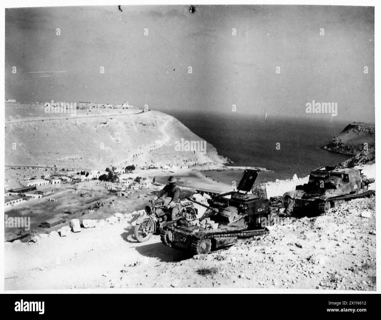 PICTURES TAKEN IN BARDIA An Australian motorcyclist passing two