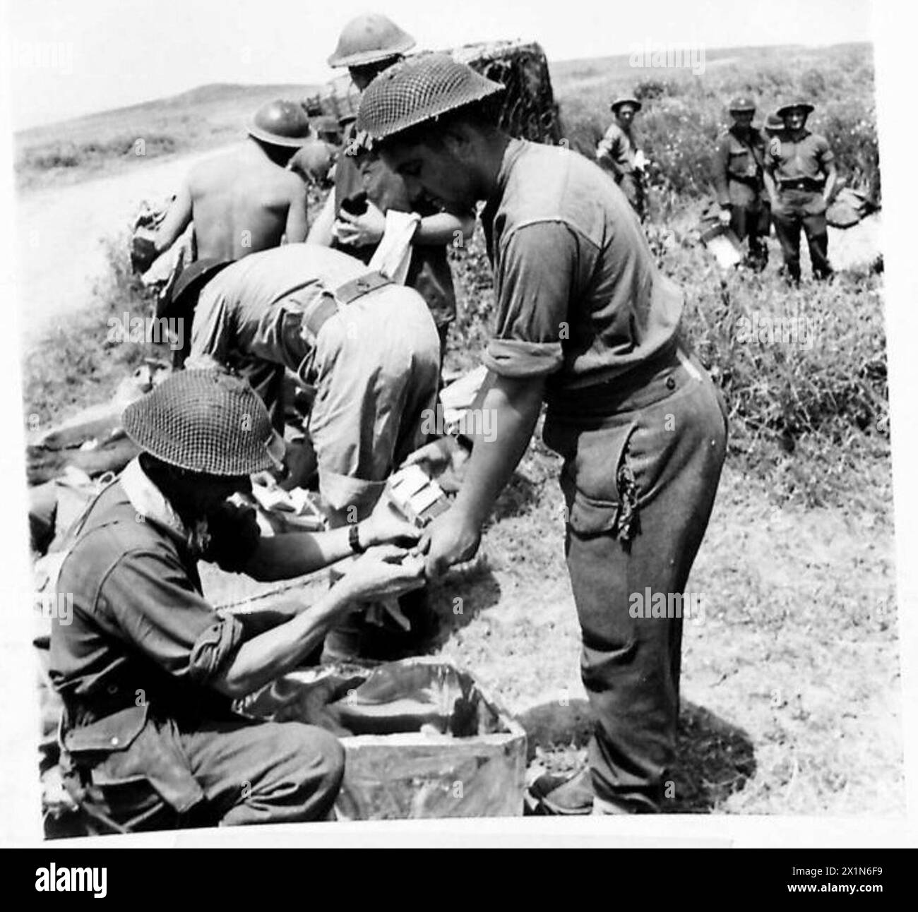 A Quartermaster of a Field Regiment, Royal Artillery, issues new khaki ...