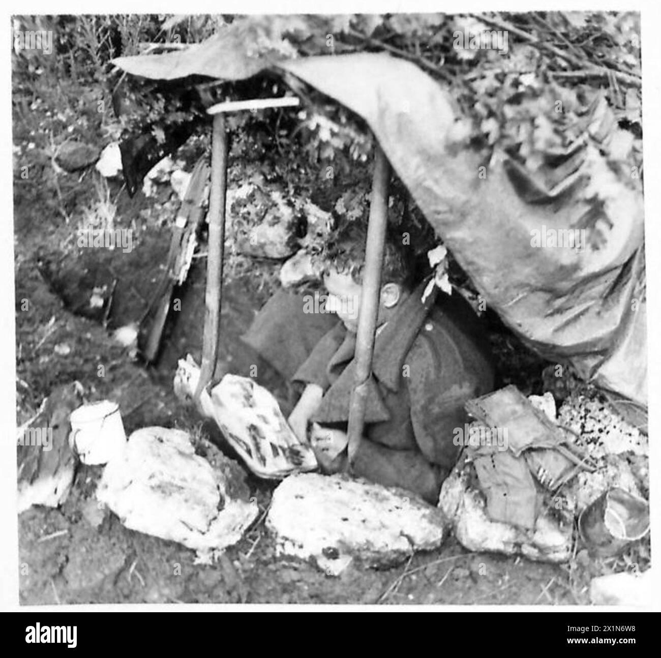 Private F. Parrick of Clapton, London, is in a cubby hole on the ...