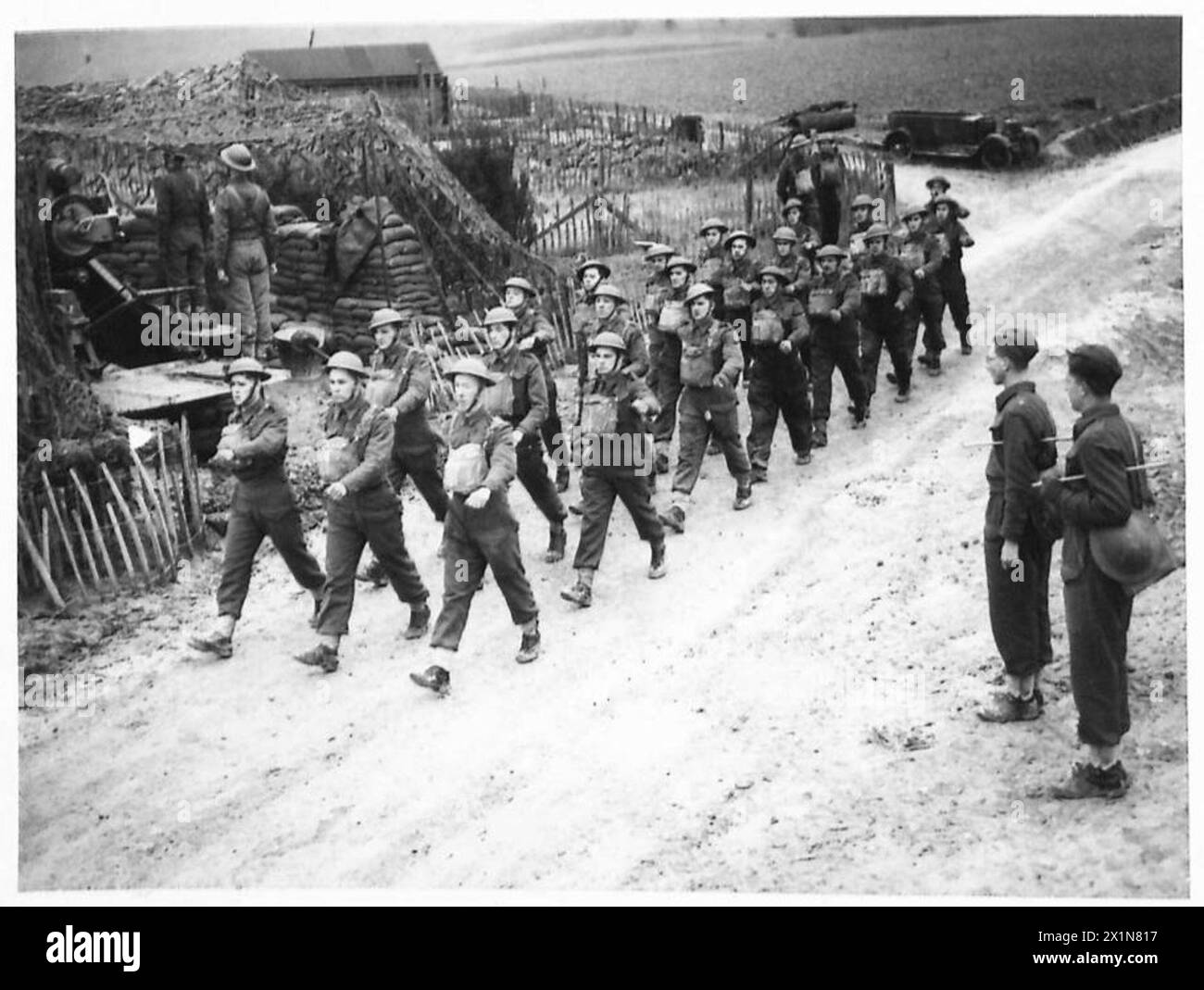 NEWFOUNDLAND GUNNERS - The men arriving at the gun positions from their billets. As will be seen, they are good hefty types, British Army Stock Photo