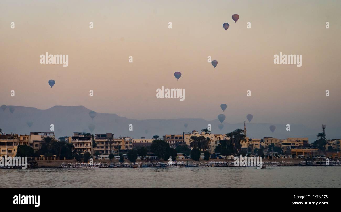 sunrise view from the Nile of hot air balloons over Luxor , Egypt Stock Photo