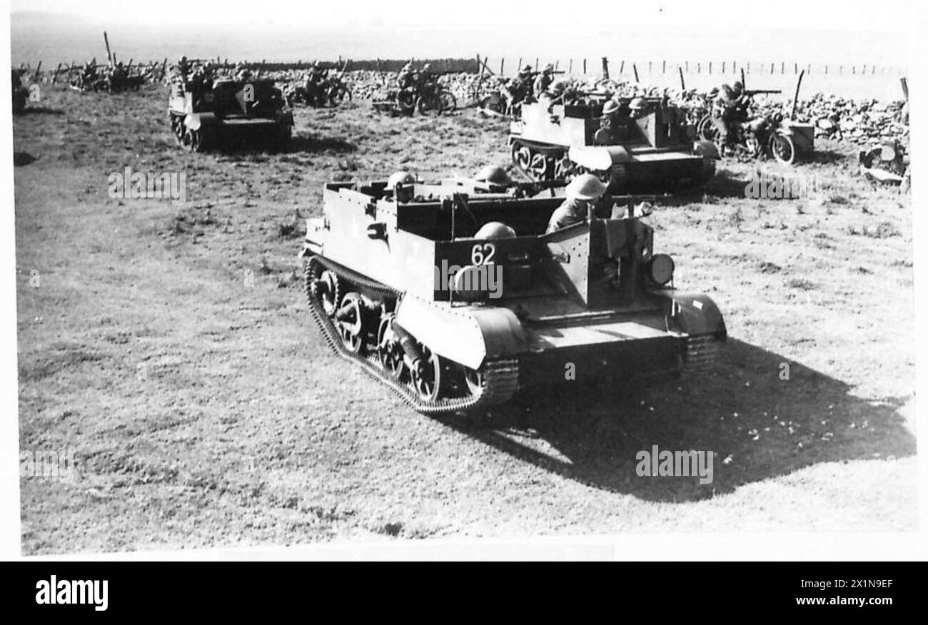 ROUNDING UP ENEMY PARACHUTISTS - The Bren gun carriers now come into action, whilst the Motor cyclist platoon remains on the alert, British Army, 5th Battalion, Border Regiment, British Army, 125th Infantry Brigade, British Army, 42nd Division Stock Photo