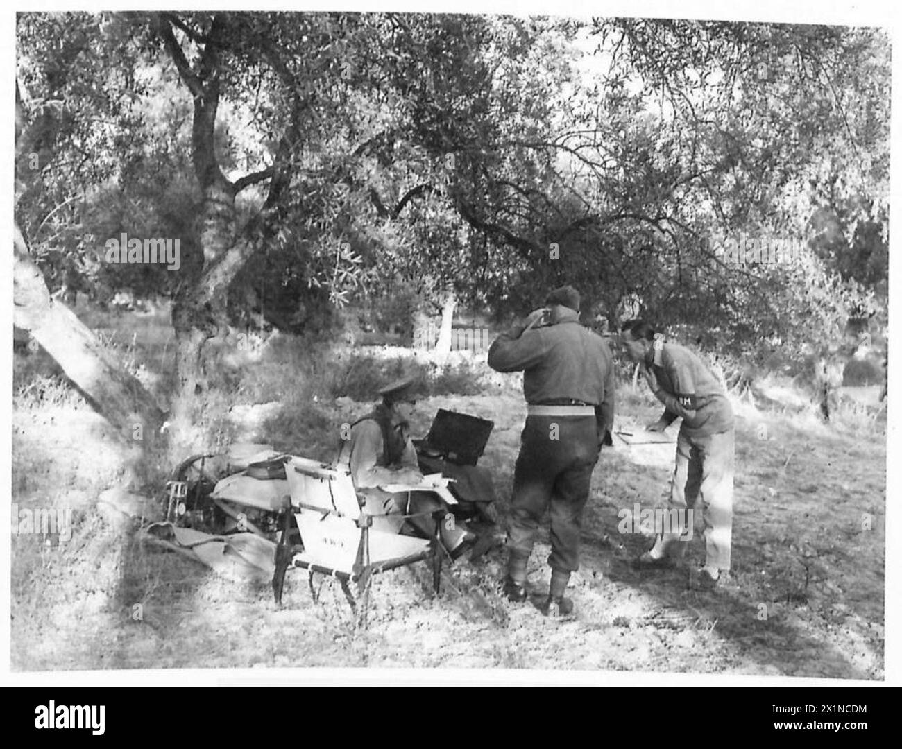 BRITISH TROOPS ON WAY AND ARRIVAL AT CRETE - The Force Commander in his H.Q. in an olive grove , British Army Stock Photo