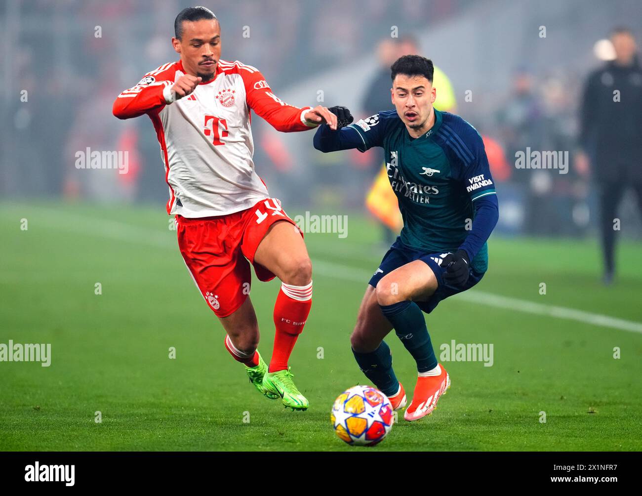 Bayern Munich's Leroy Sane (left) and Arsenal's Gabriel Martinelli battle for the ball during the UEFA Champions League quarter-final, second leg match at the Allianz Arena, Munich. Picture date: Wednesday April 17, 2024. Stock Photo