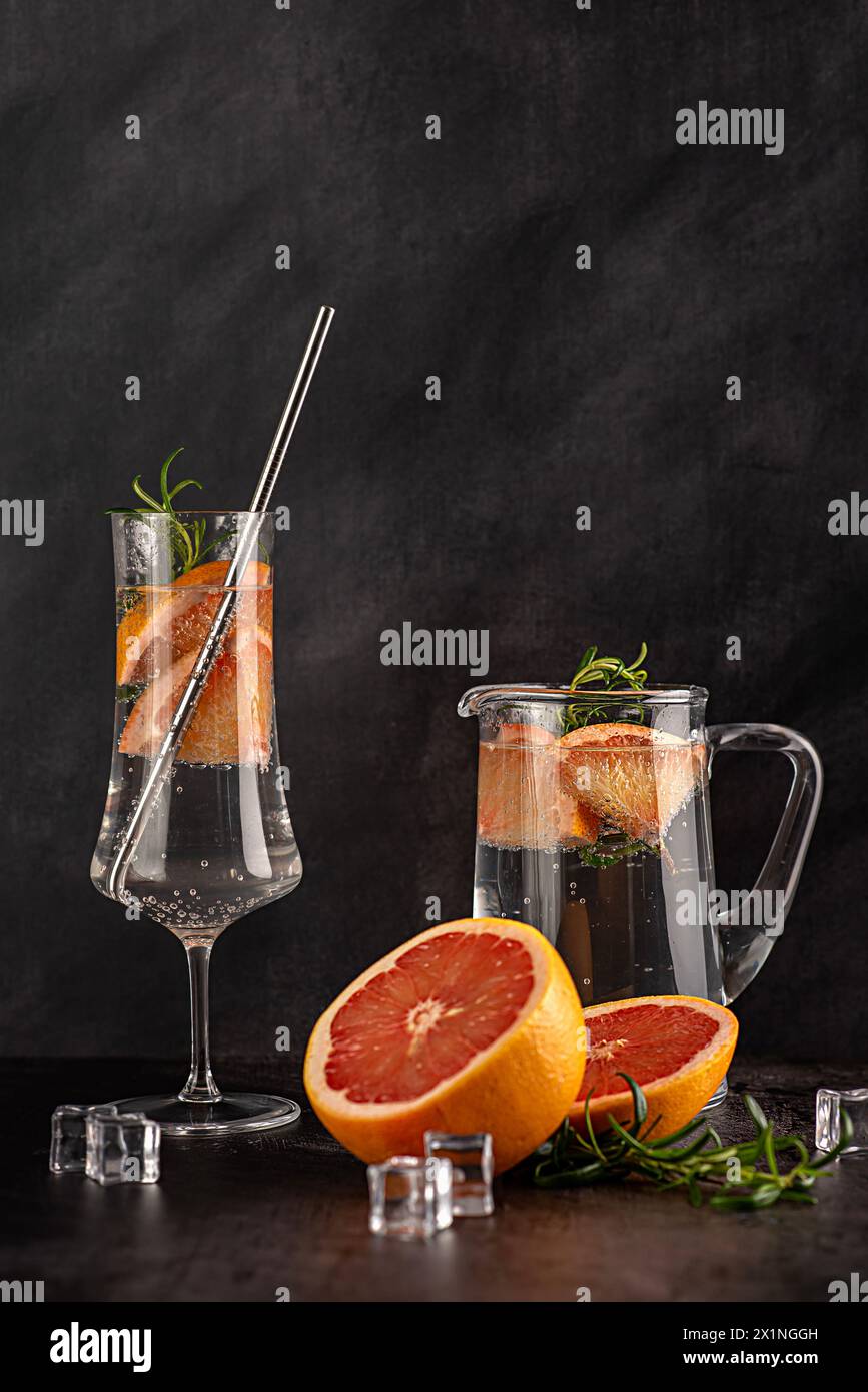 Blank photography of soda, grapefruit, rosemary, cocktail, rum, gin, tonic, fruit; ice, carbonated drink, refreshment, beverage, liquid; water;  thirs Stock Photo