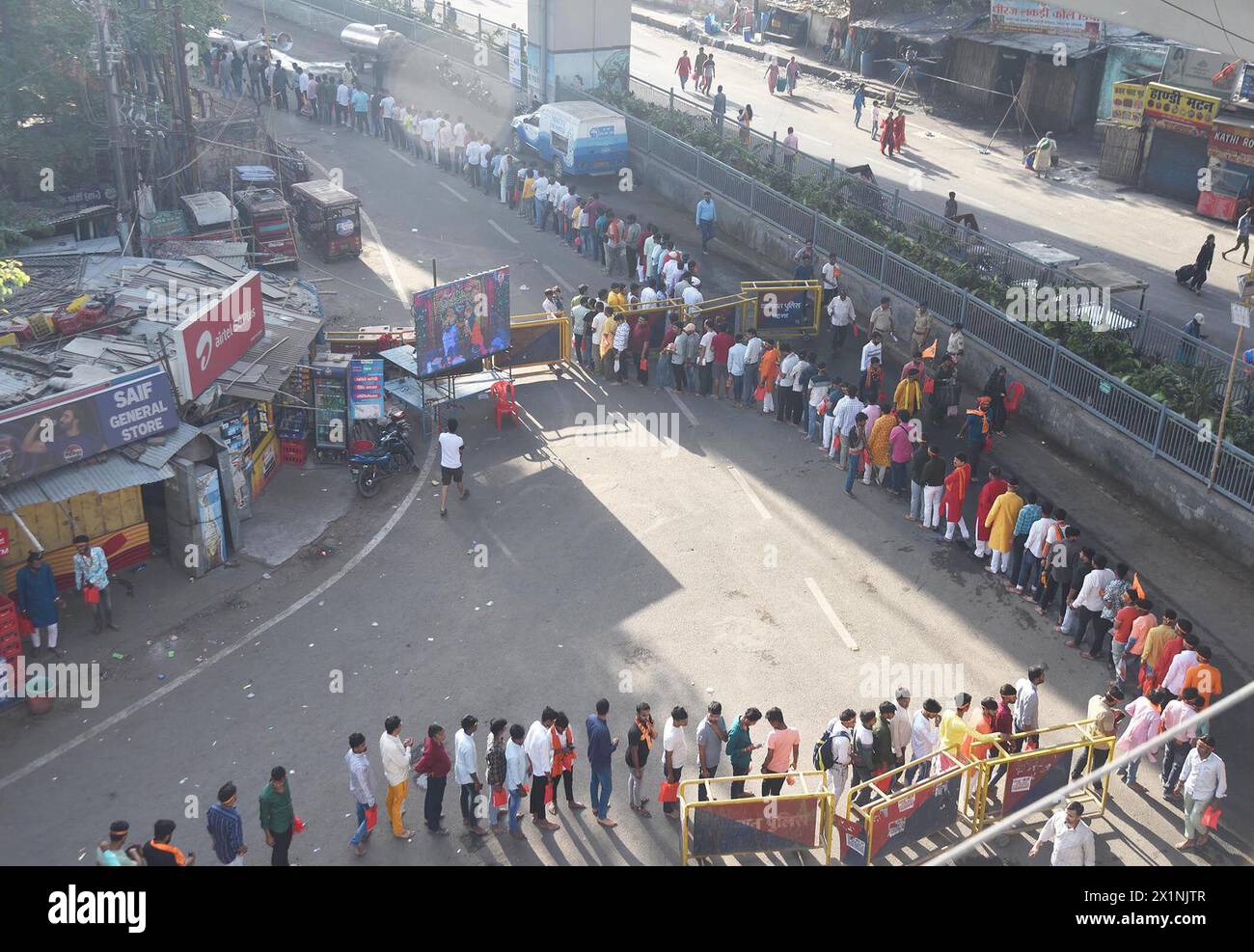 PATNA, INDIA - APRIL 17: Devotees standing in queue for worshiping lord ...