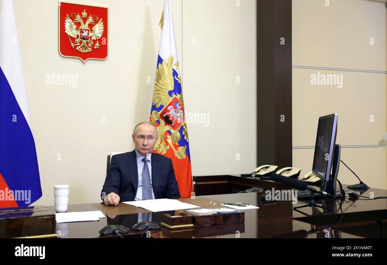 Novo-Ogaryovo, Russia. 17th Apr, 2024. Russian President Vladimir Putin hosts a remote meeting via video conference with with members of the government from the Novo-Ogaryovo state residence, April 17, 2024 in Moscow Oblast, Russia. Credit: Gavriil Grigorov/Kremlin Pool/Alamy Live News Stock Photo