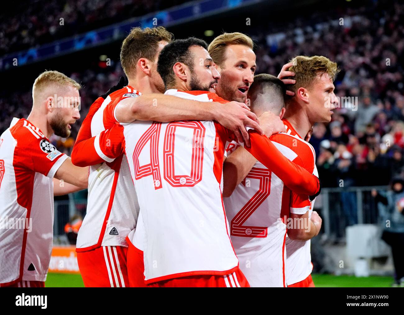 Bayern Munich's Joshua Kimmich (right) celebrates with team-mates after scoring their side's first goal of the game during the UEFA Champions League quarter-final, second leg match at the Allianz Arena, Munich. Picture date: Wednesday April 17, 2024. Stock Photo
