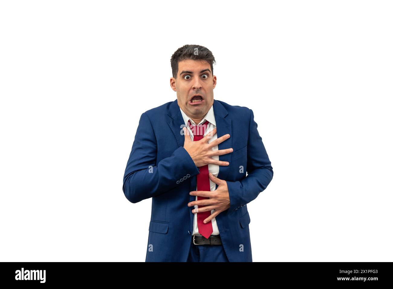 businessman clutches his chest with his hands, displaying fear and