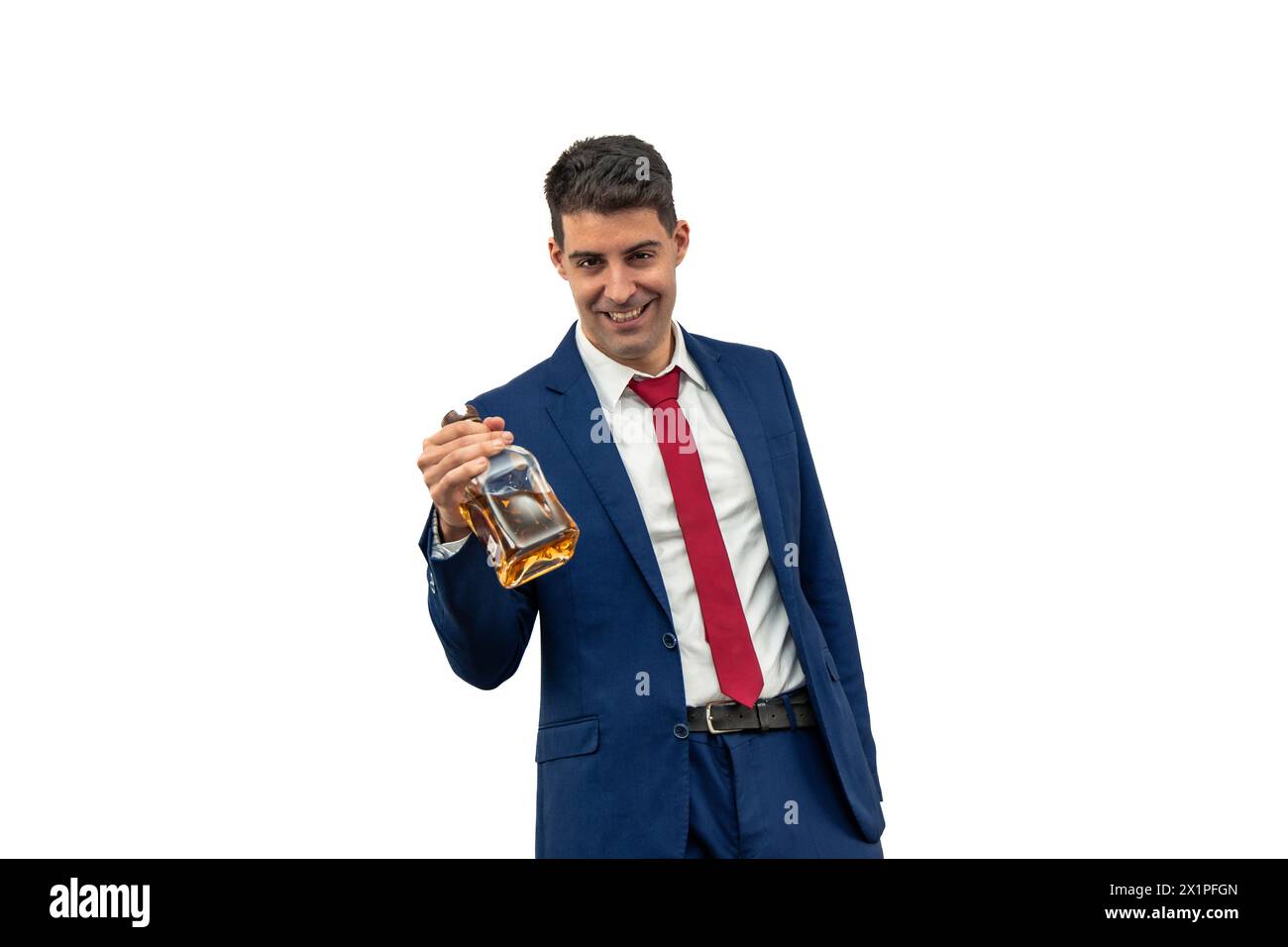 drunk businessman holding a bottle of liquor in his hand. alcohol-induced impairment and irresponsibility, this image serves as a cautionary tale agai Stock Photo