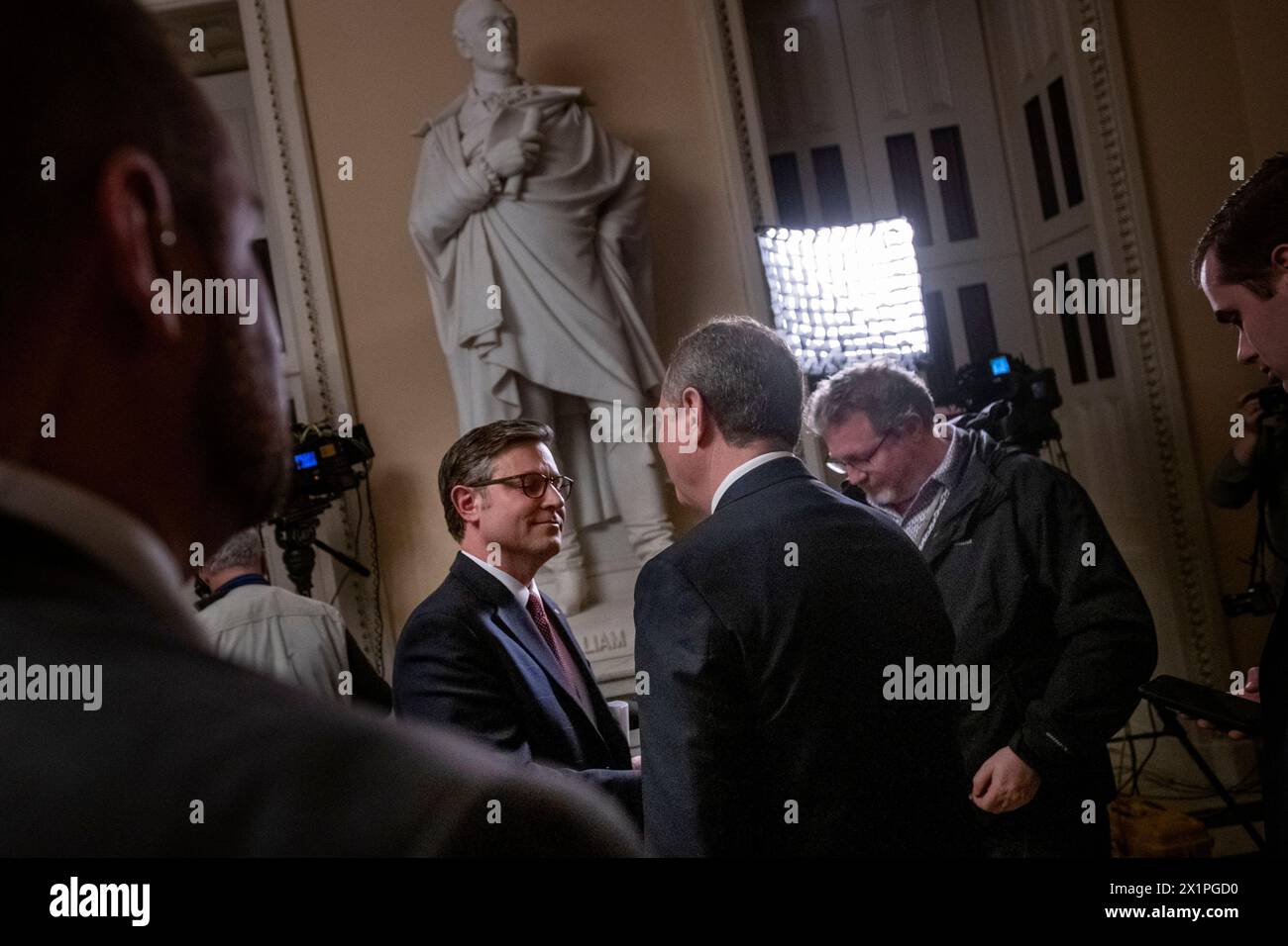 Washington, United States Of America. 17th Apr, 2024. Speaker of the US House of Representatives Mike Johnson (Republican of Louisiana), left, bumps into United States Representative Adam Schiff (Democrat of California) during their television interviews, after the House impeachment of United States Secretary of Homeland Security Alejandro Mayorkas was defeated in the Senate at the US Capitol in Washington, DC, April 17, 2024. Credit: Rod Lamkey/CNP/Sipa USA Credit: Sipa USA/Alamy Live News Stock Photo
