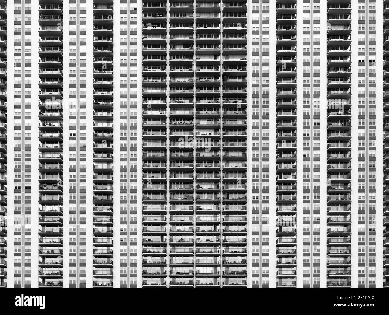 Black and white photograph of a tall city skyscraper Stock Photo - Alamy