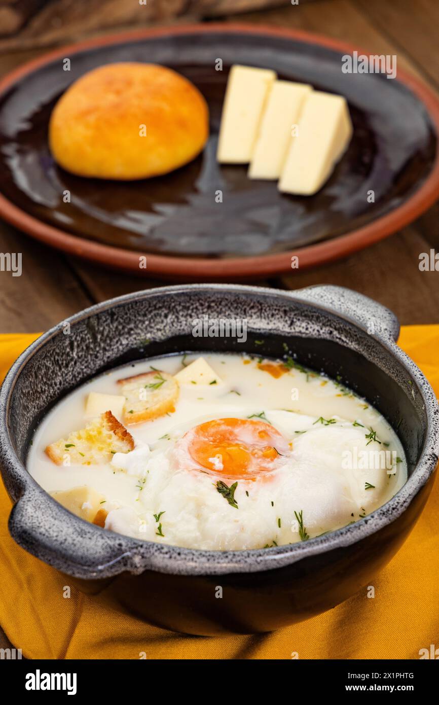 Changua - Egg with milk, typical soup for breakfast in Bogota Stock Photo