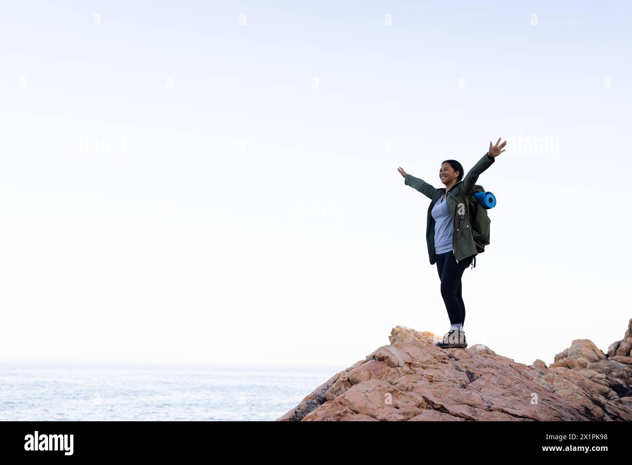 Hiker on top mountain arms hi-res stock photography and images - Alamy