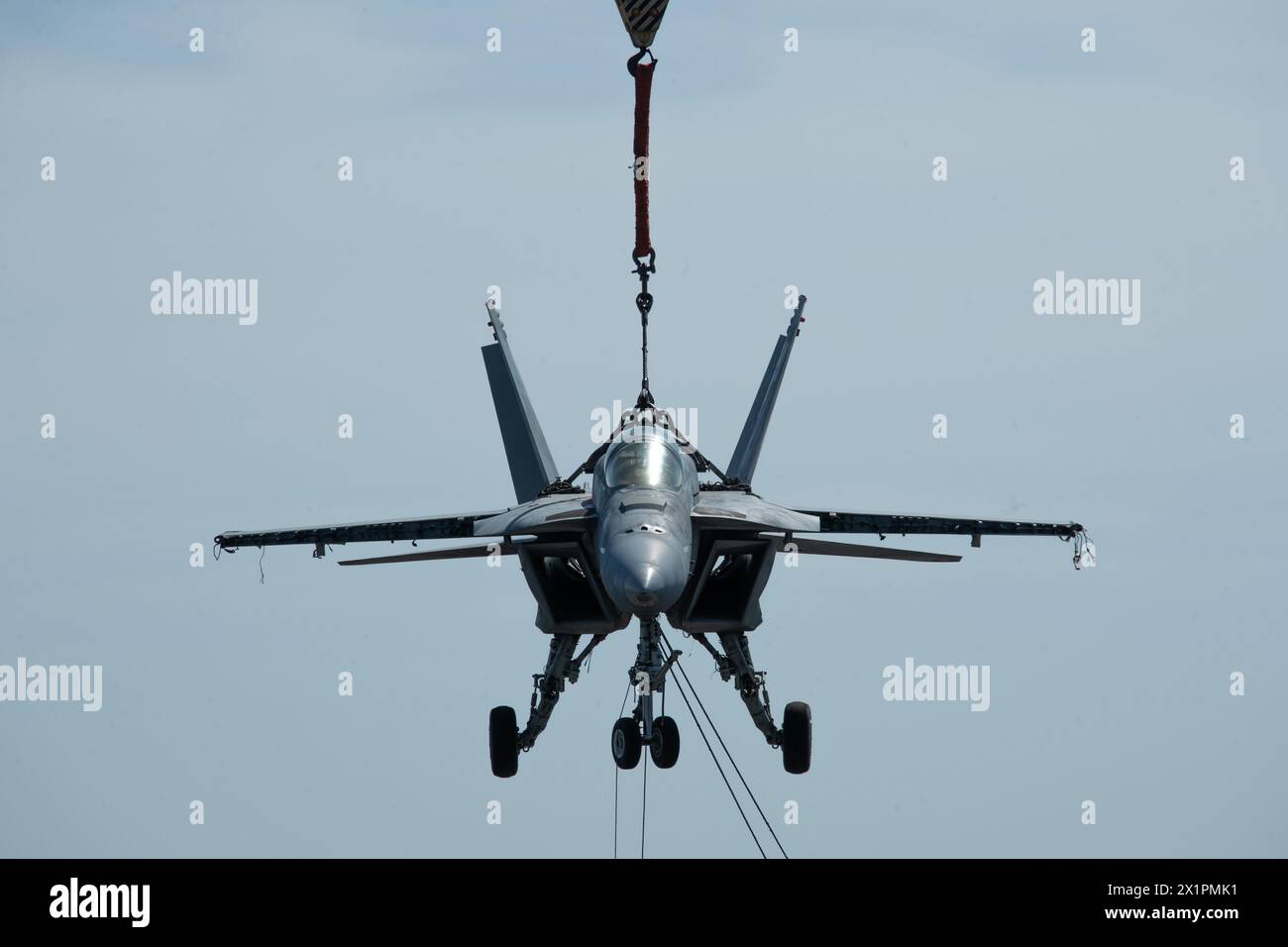 norfolk-va-april-15-2024-a-crane-operated-by-naval-facilities