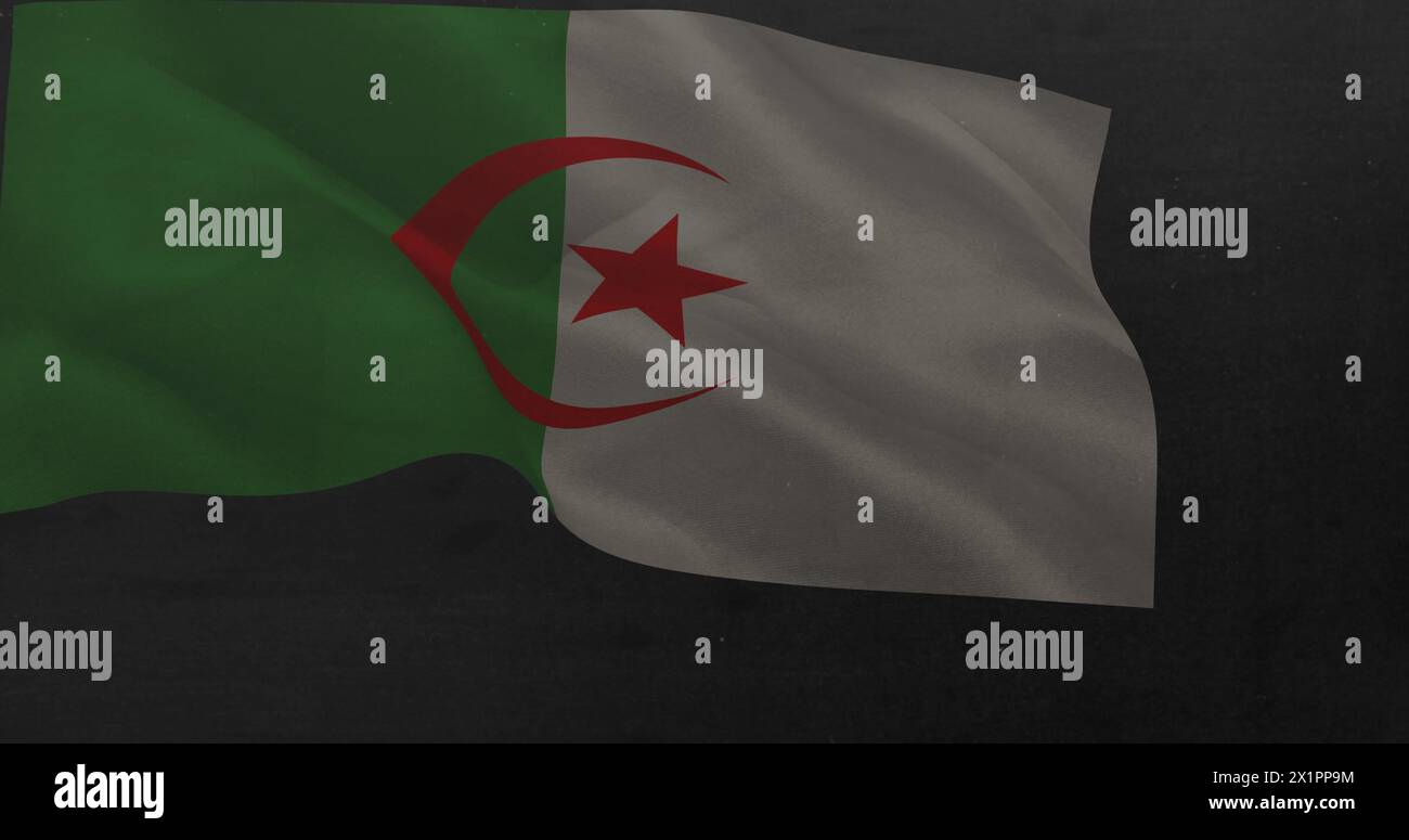 A flag with green and white sections and red crescent and star is waving Stock Photo