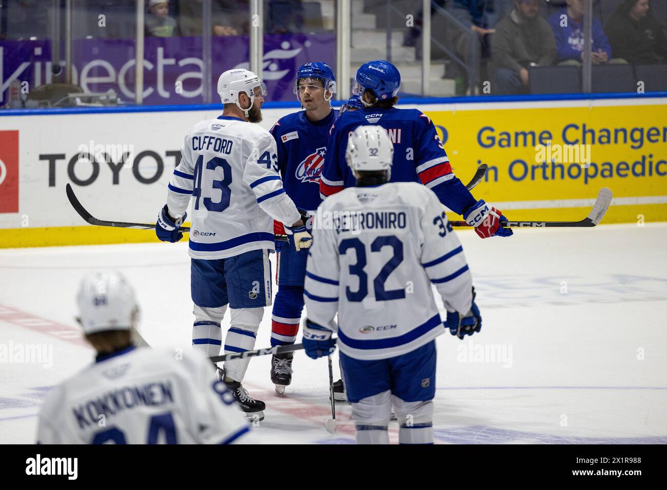 April 17th, 2024: Rochester Americans defenseman Ryan Johnson (23) exchanges words with Toronto Marlies forward Kyle Clifford (43) in warmups. The Rochester Americans hosted the Toronto Marlies in an American Hockey League game at Blue Cross Arena in Rochester, New York. (Jonathan Tenca/CSM) (Credit Image: © Jonathan Tenca/Cal Sport Media) Stock Photo