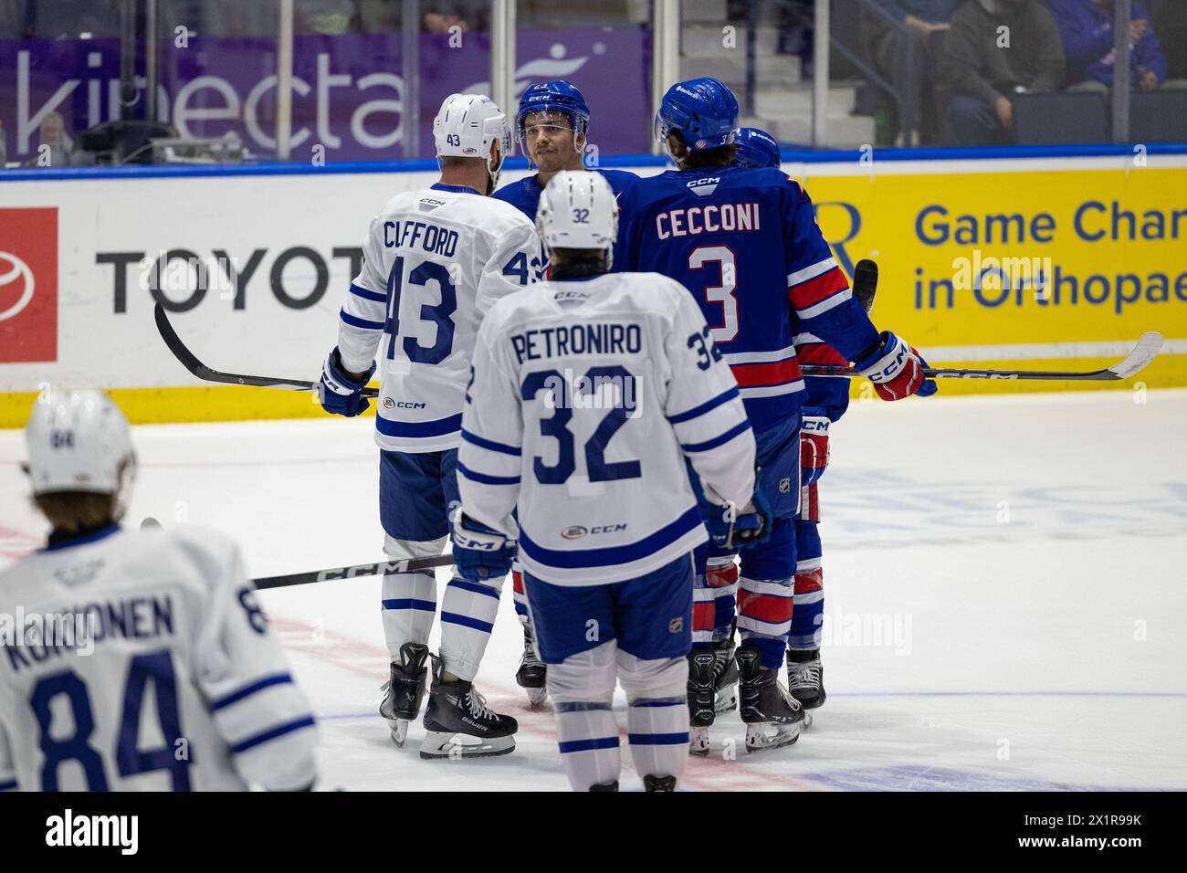 April 17th, 2024: Rochester Americans defenseman Ryan Johnson (23) exchanges words with Toronto Marlies forward Kyle Clifford (43) in warmups. The Rochester Americans hosted the Toronto Marlies in an American Hockey League game at Blue Cross Arena in Rochester, New York. (Jonathan Tenca/CSM) Stock Photo