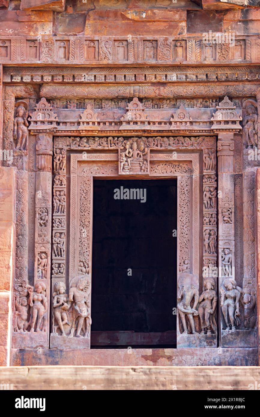 Main Entrance  doorway with Vishnu at the centre and panes with carved bands of ganas, amorous couples and dwarpalas. Dashavatar Temple, Deogarh, Lali Stock Photo