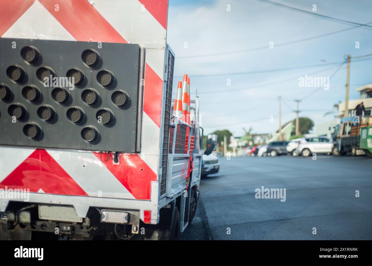 Road maintenance truck carrying road signage and traffic cones parked ...