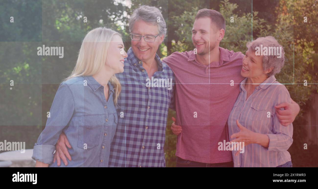 Caucasian family with young adult and mature adults enjoying time together Stock Photo