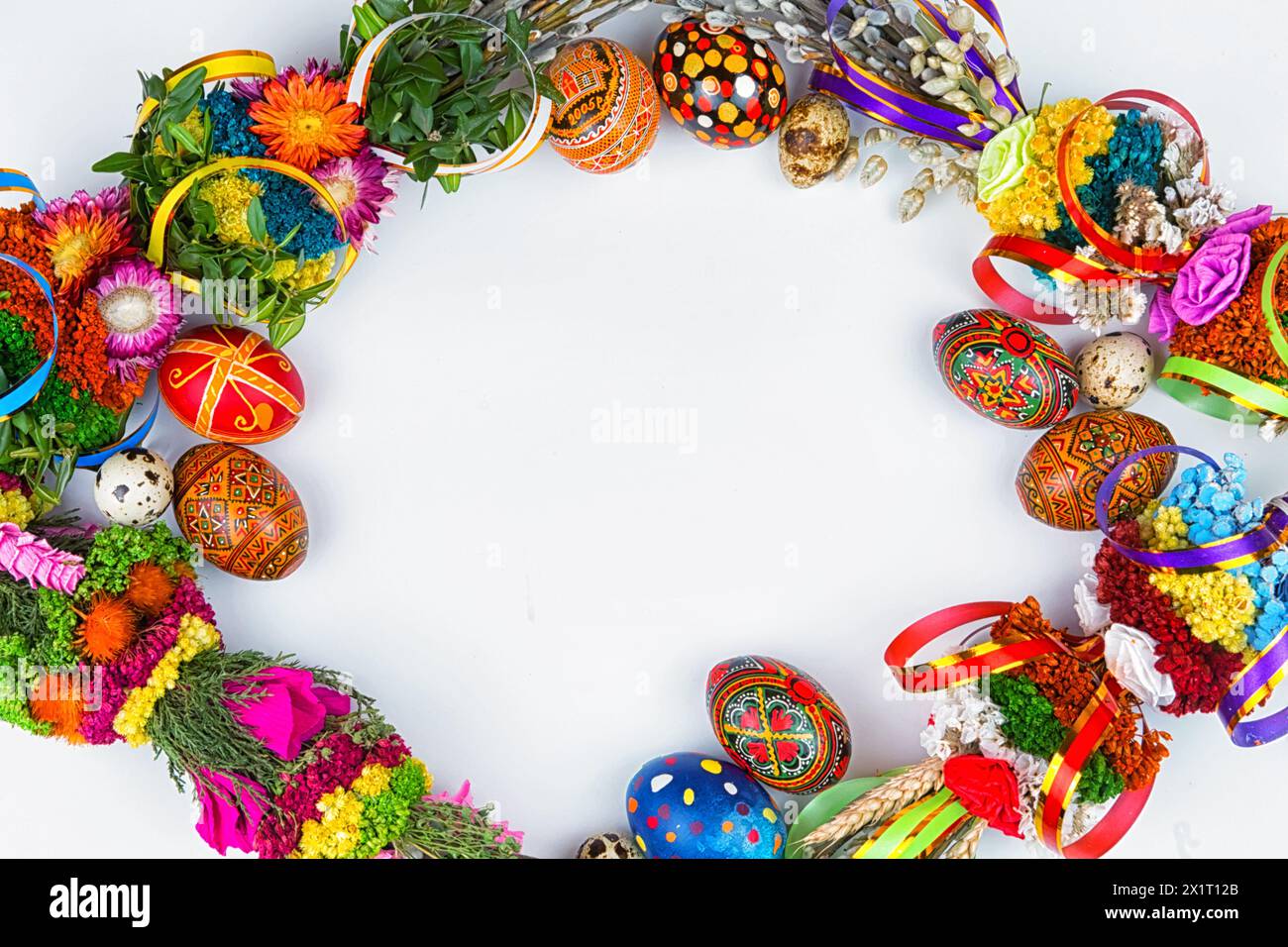 Easter eggs and willow branches on a white background Stock Photo - Alamy
