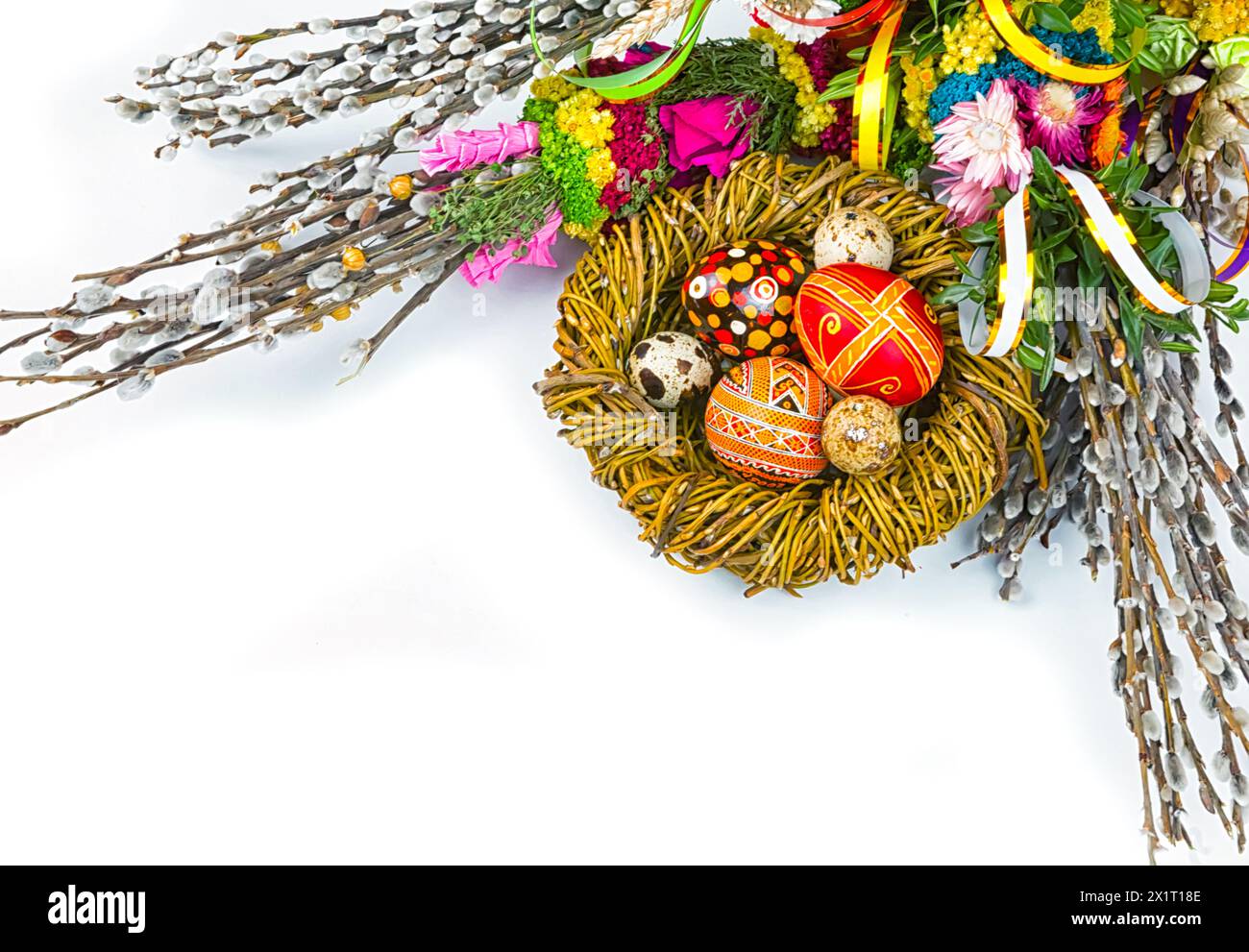 Easter eggs and willow branches on a white background Stock Photo - Alamy