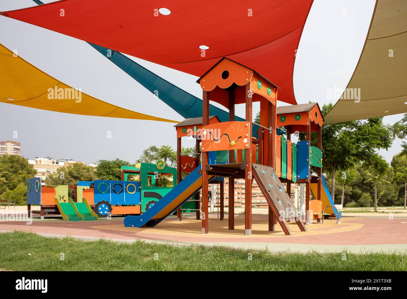 Vibrant children's playground under protective shade sails. Stock Photo