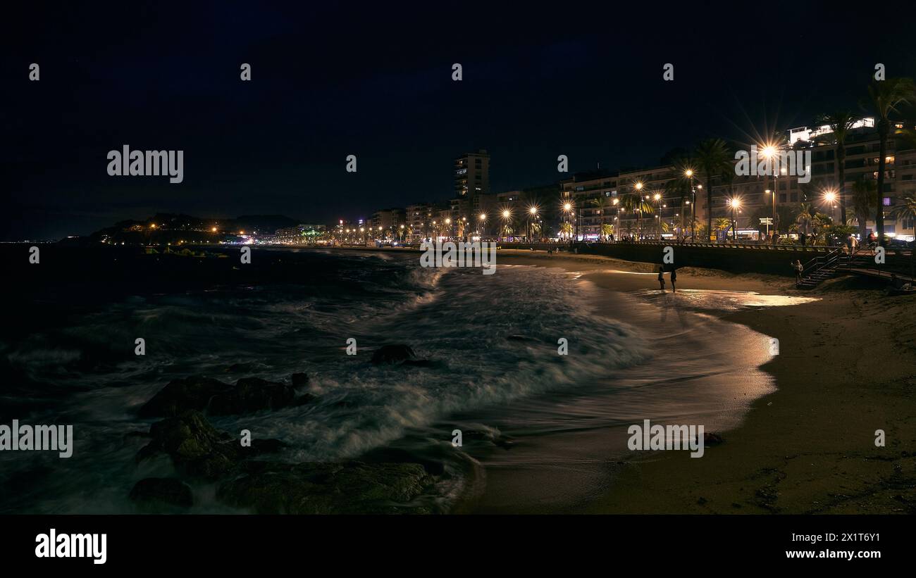 Mediterranean embankment of evening Lloret de Mar, Spain. Stock Photo