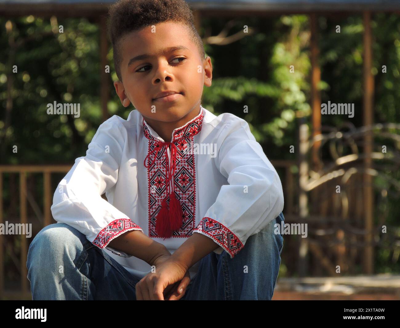 Cute boy in traditional wear Stock Photo - Alamy