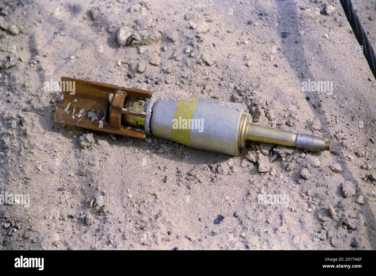 1st April 1991 An unexploded American Mk 118 Mod1 bomblet from a CBU-100 cluster bomb, on the Highway of Death, west of Kuwait City on the main highway to Basra. Stock Photo
