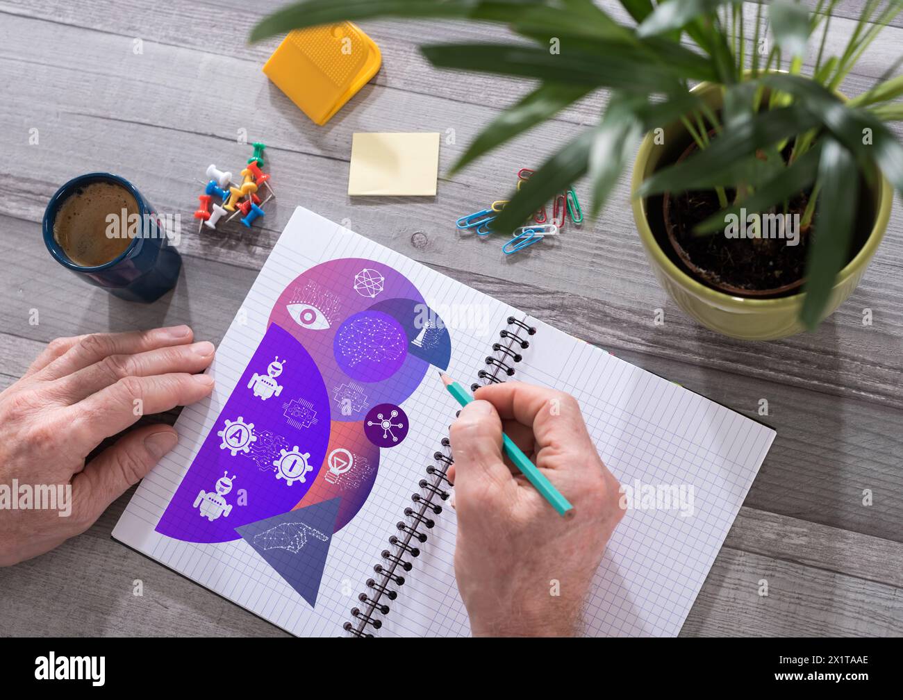 Ai concept drawn on a notepad placed on a desk Stock Photo
