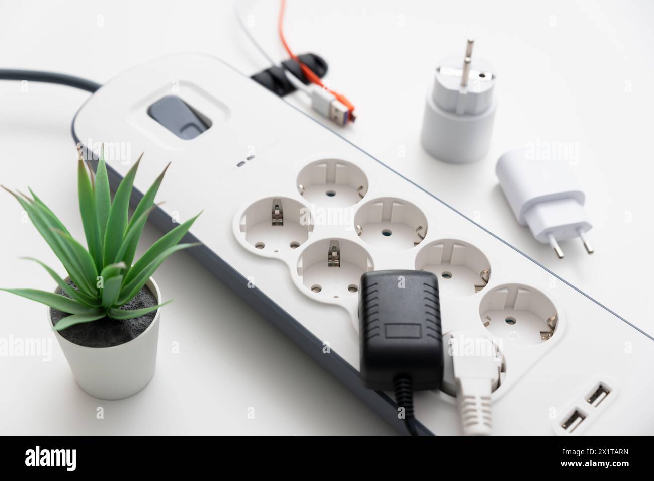 Electric power strip. Power plugs and a one multi socket electrical ...