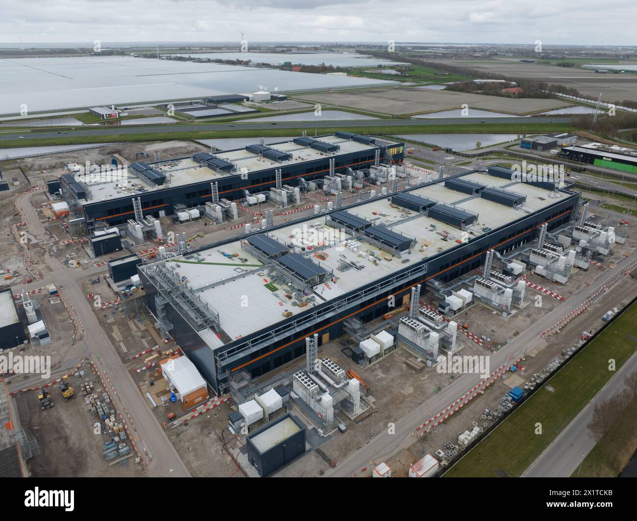 Aerial drone view on infrastructure, data centers in Middenmeer, The Netherlands. Large