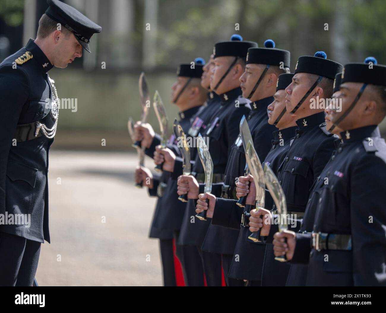 Wellington Barracks, London, UK. 18th Apr, 2024. The Queen's Gurkha Signals receive their Fit For Role Inspection to ensure they are ready to take up Ceremonial Public Duties guarding Buckingham Palace, the Tower of London, St James Palace, and Windsor Castle. Under guidance from the Household Division, they have undergone rigorous inspections and drill practice to raise them to the highest standard. They put everything they have learnt and rehearsed into practice as they face their Fit For Role Inspection on the Wellington Barracks Parade Ground inspected by the Brigade Major, Adjutant London Stock Photo