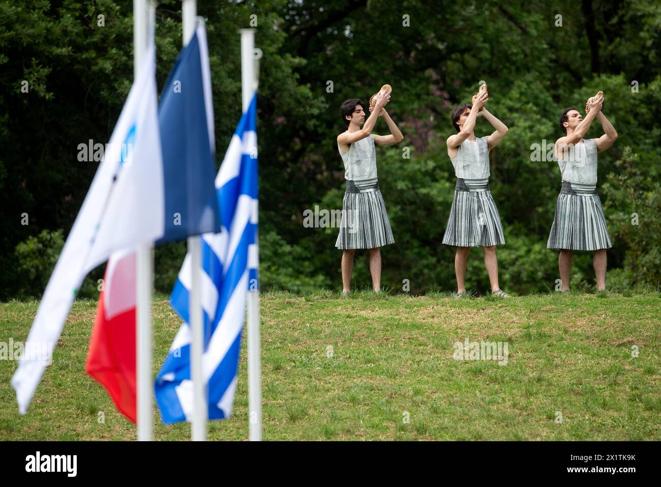 Olympia, Greece - April 15, 2024: Olympic flame lighting ceremony for the Paris 2024 Summer Olympic Games in Ancient Olympia, Greece Stock Photo