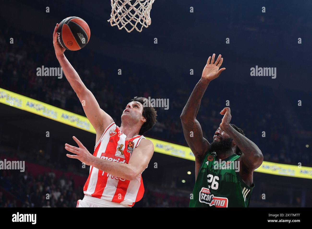 Mathias Lessort of Panathinaikos AKTOR Athens tries to block Milos Teodosic of Crvena Zvezda Meridianbet Belgrade under the basket Stock Photo