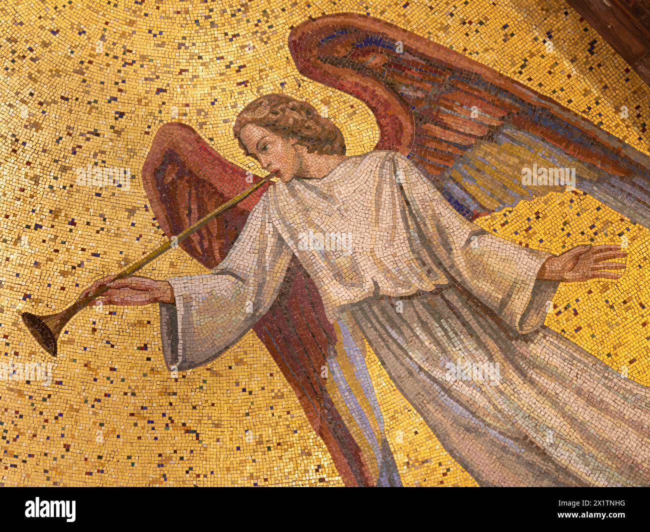 MILAN, ITALY - MARCH 4, 2024: The detial of mosaic of angel with the trumpet in the church Chiesa di San Agostino designed by Elena Mazzari Stock Photo