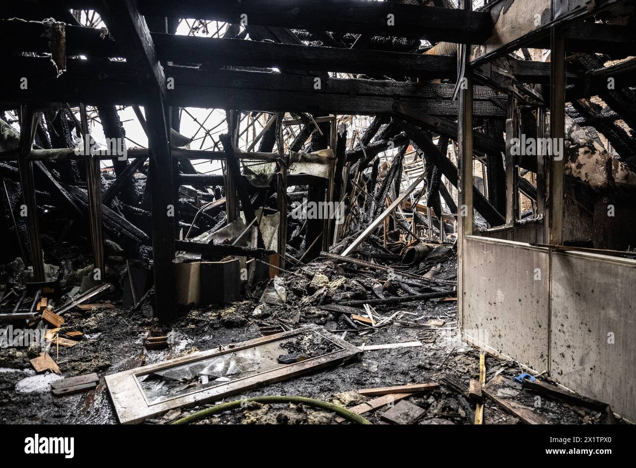 Fire and water damage inside the Old Stock Exchange building, Børsen,  in central Copenhagen, Denmark, on April 17, 2024, the day after a fire raged through the 17th century building. Photo: Jens Christian / Expressen / TT / code 7172 Stock Photo